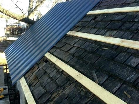 post and beam house w metal roof and wood shingles|Installing a Metal Roof Over Shingles: A .